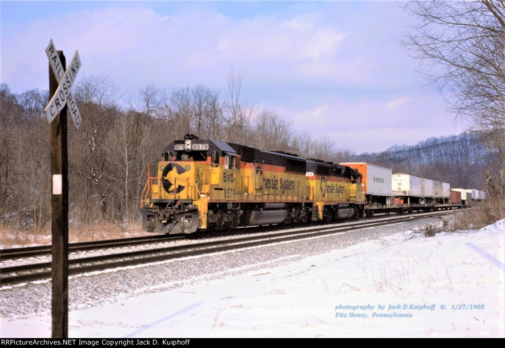 Chessie B&O SD50 8579 - GP40 -2 6194, with an eastbound R138 on the B&O Keystone sub at Fitz Henry, Pennsylvania. January 27, 1988. 